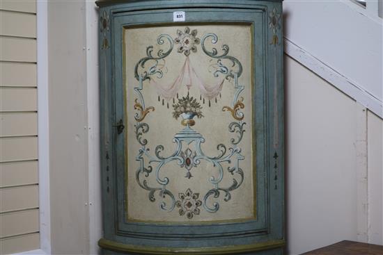 An Italian 18th century design painted bowfronted standing corner cupboard